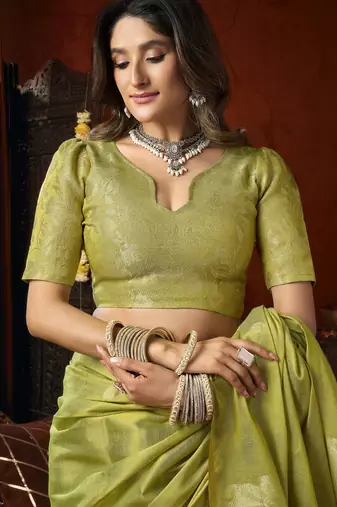  tissue saree with allover cow butta design & fancy tassels