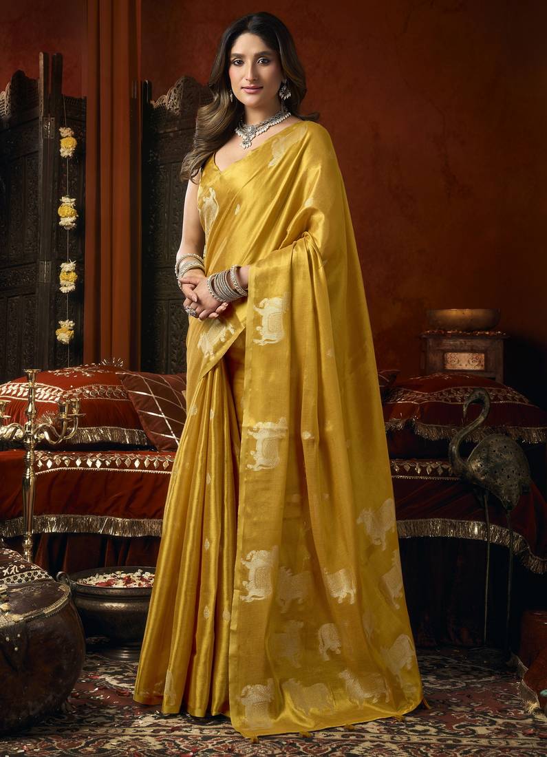 Heavy tissue saree with allover cow butta design & fancy tassels