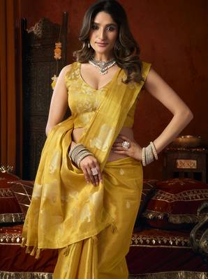  tissue saree with allover cow butta design & fancy tassels 2