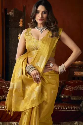  tissue saree with allover cow butta design & fancy tassels