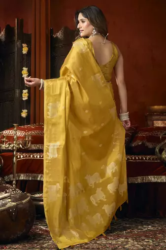  tissue saree with allover cow butta design & fancy tassels