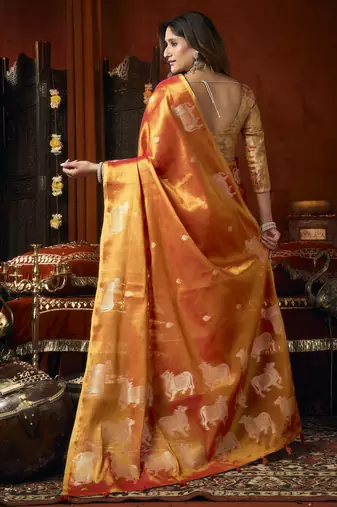  tissue saree with allover cow butta design & fancy tassels