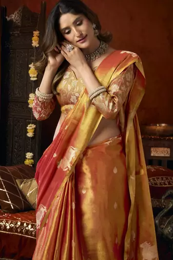  tissue saree with allover cow butta design & fancy tassels