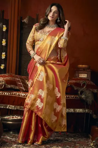  tissue saree with allover cow butta design & fancy tassels
