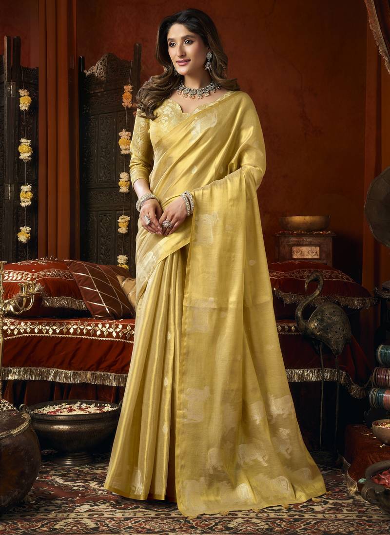 Heavy tissue saree with allover cow butta design & fancy tassels