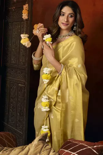  tissue saree with allover cow butta design & fancy tassels