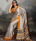 Printed ajrakh satin crepe saree – traditional art with a modern touch