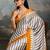 Printed ajrakh satin crepe saree – traditional art with a modern touch