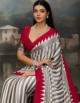 Printed ajrakh satin crepe saree  art with a modern touch 4