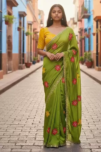 Green rangoli silk embroidery work party wear designer saree