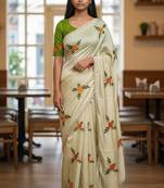 Cream rangoli silk embroidery work party wear designer saree