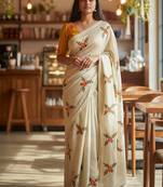 Cream rangoli silk embroidery work party wear designer saree