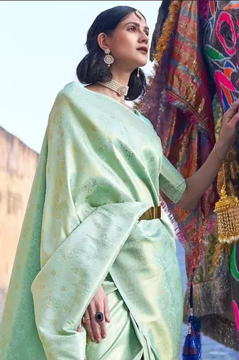Pista green silk blend banarasi saree with unstitched blouse piece