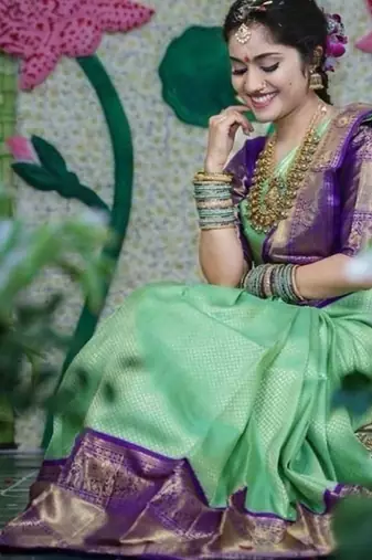 Pista green silk blend banarasi saree with unstitched blouse piece