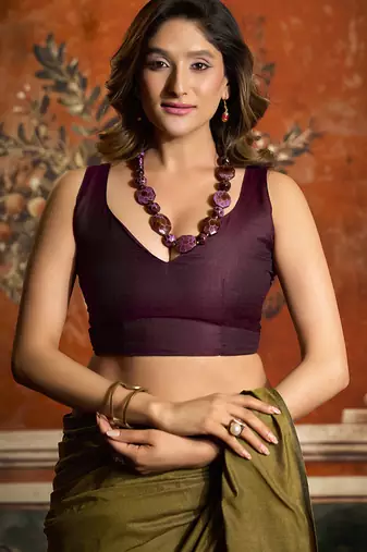 Olive mal cotton contrast pallu fancy tassels saree