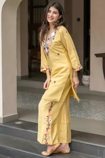 Yellow french crepe heavy thread embroidery work kurta with pant