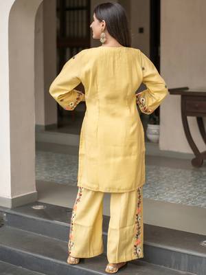 Yellow french crepe heavy thread embroidery work kurta with pant 3