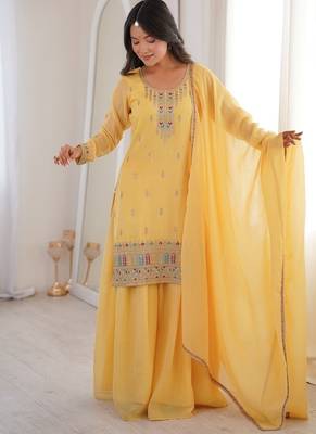 Elegant yellow embroidered ethnic suit set for women 1