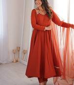 Women rust ethnic anarkali kurta set for festive & wedding wear