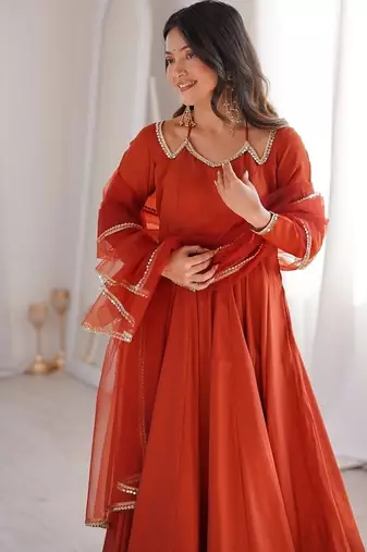 Women rust ethnic anarkali kurta set for festive & wedding wear