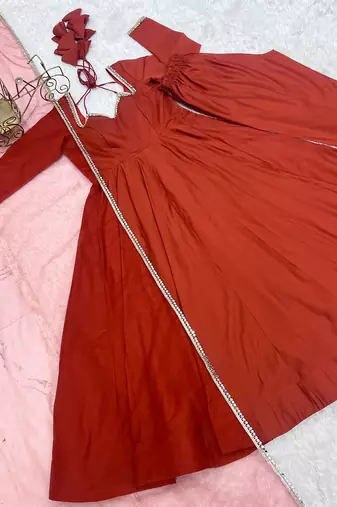 Women rust ethnic anarkali kurta set for festive & wedding wear