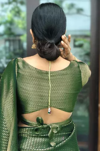 Green silk blend banarasi saree with unstitched blouse piece