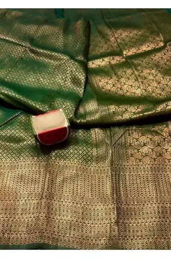 Green silk blend banarasi saree with unstitched blouse piece