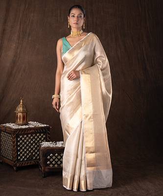 gold handloom banarasi silk saree with rich zari detailing 1