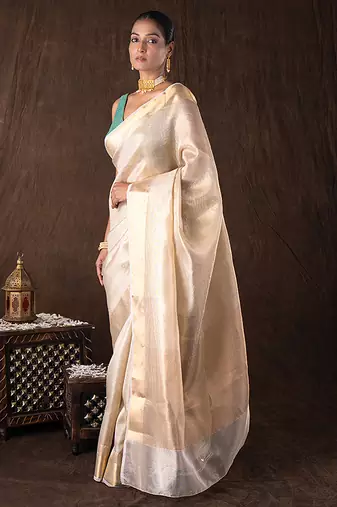 gold handloom banarasi silk saree with rich zari detailing