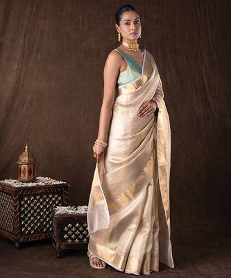 gold handloom banarasi silk saree with rich zari detailing 3