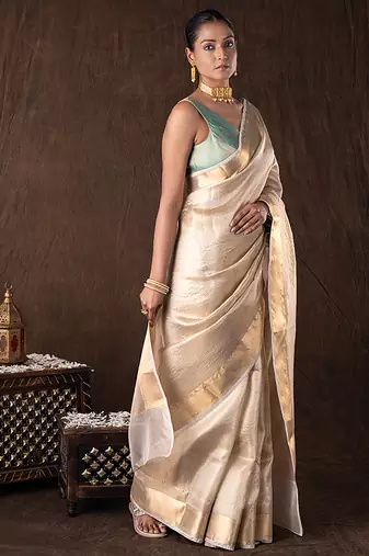 gold handloom banarasi silk saree with rich zari detailing