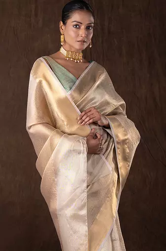 gold handloom banarasi silk saree with rich zari detailing