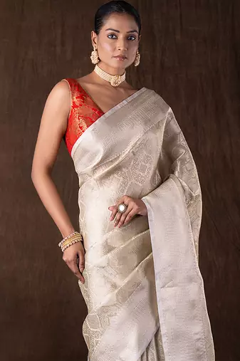 ivory handloom silk saree with subtle woven texture