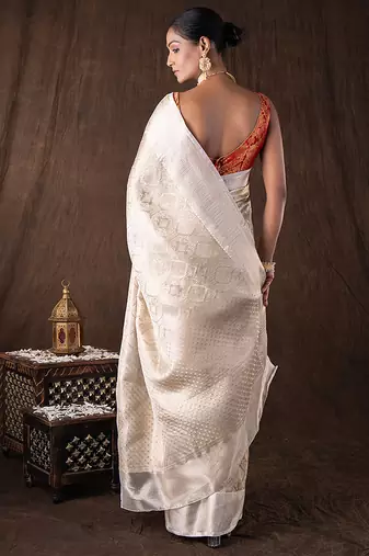 ivory handloom silk saree with subtle woven texture