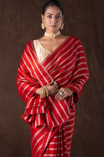 red handloom silk saree with striped zari pattern
