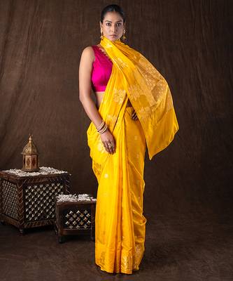 bright yellow handloom pure silk saree with woven motifs 1