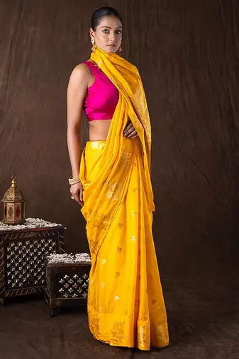 bright yellow handloom pure silk saree with woven motifs