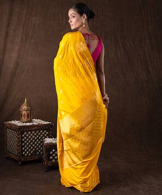 bright yellow handloom pure silk saree with woven motifs 5