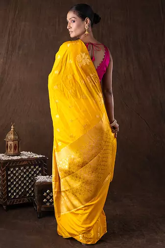 bright yellow handloom pure silk saree with woven motifs