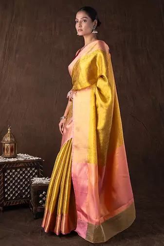 golden handloom banarasi silk saree with textured zari weave
