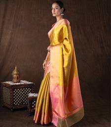 golden handloom banarasi silk saree with textured zari weave