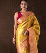 golden handloom banarasi silk saree with textured zari weave