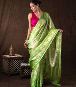 green handloom tissue silk saree with shimmer finish