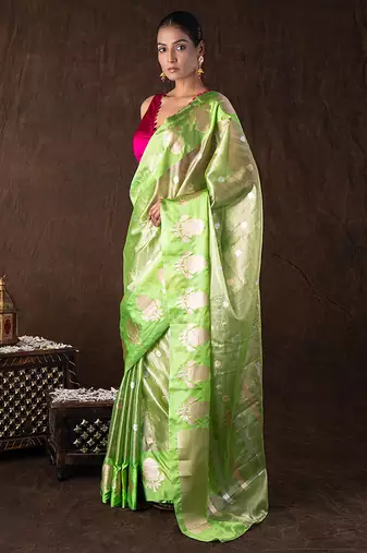 green handloom tissue silk saree with shimmer finish