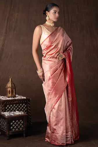 red handloom tissue silk saree with subtle shine