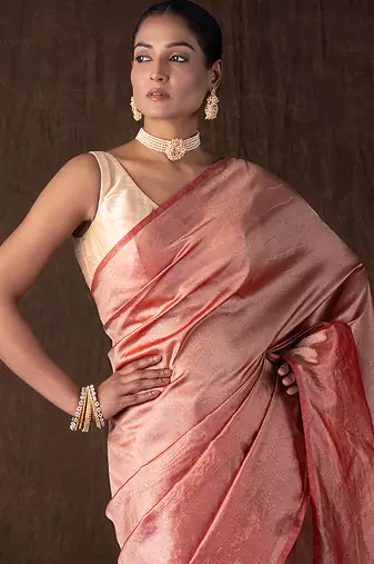 red handloom tissue silk saree with subtle shine