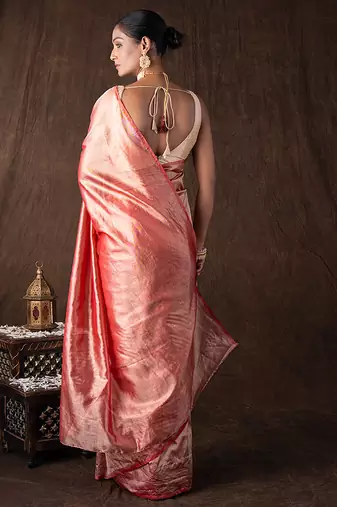 red handloom tissue silk saree with subtle shine