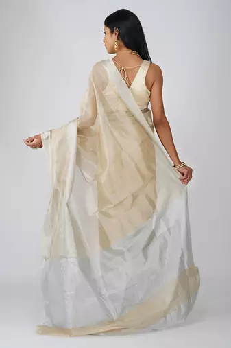 beige handloom tissue silk saree with subtle shimmer finish