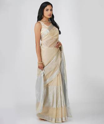 beige handloom tissue silk saree with subtle shimmer finish 4