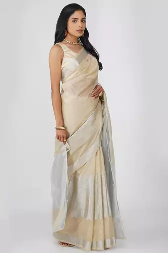 beige handloom tissue silk saree with subtle shimmer finish